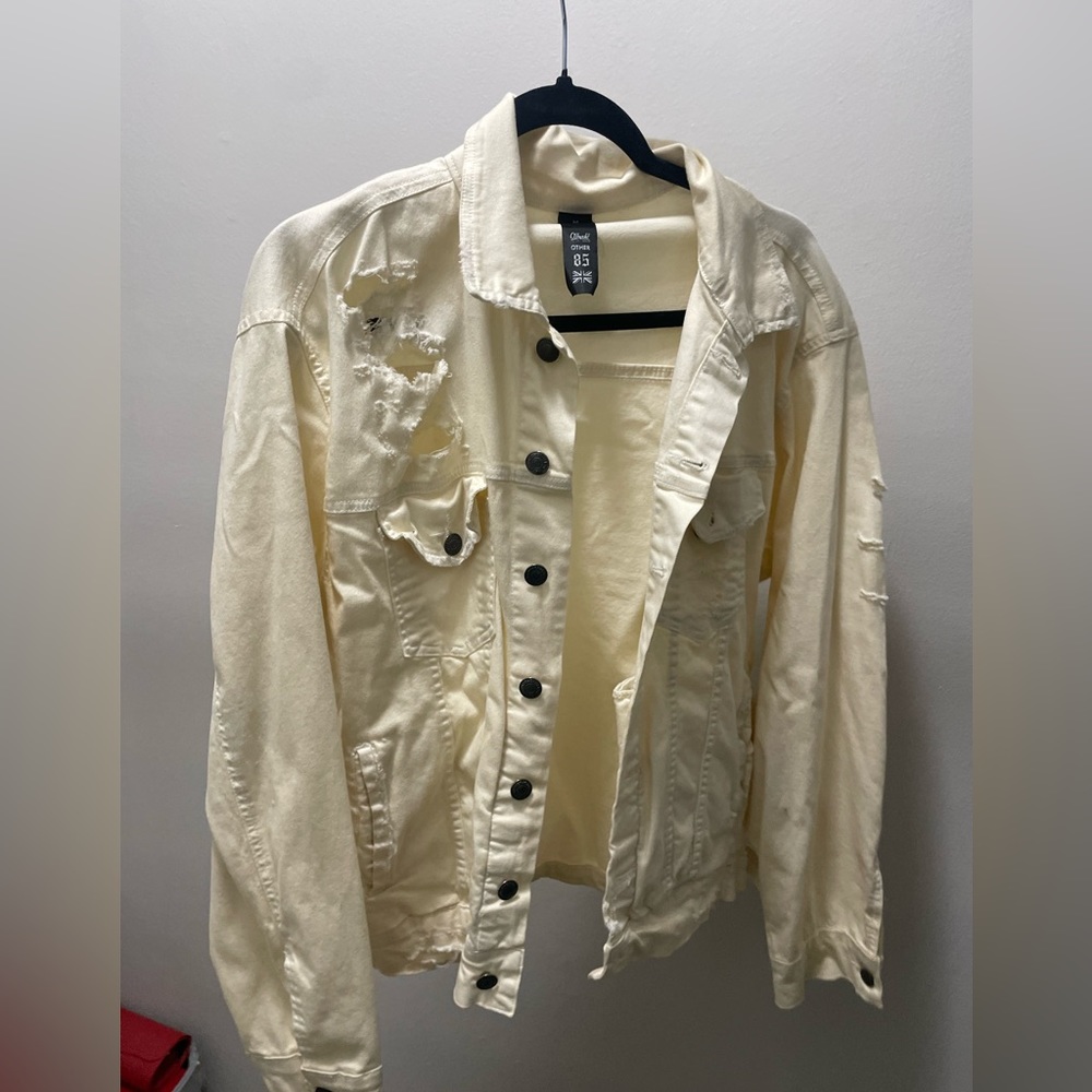 cream ripped jean jacket